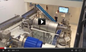 tna has an on stand demonstration of a large seasoning and conveying system at interpack.